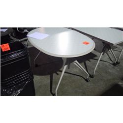 Oval table on wheels