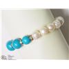 Image 1 : #10-FRESHWATER PEARL STABILIZED TURQUOISE
