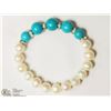 Image 2 : #10-FRESHWATER PEARL STABILIZED TURQUOISE
