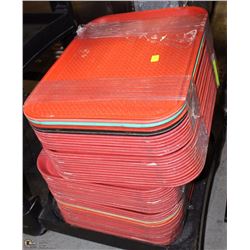 23) STACK OF RED SERVING TRAYS