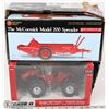 Image 1 : CASE OF DIE CAST TRACTOR WITH MCCORMICK SPREADER