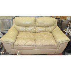 PREVIOUSLY ENJOYED BEIGE LEATHERETTE LOVE SEAT