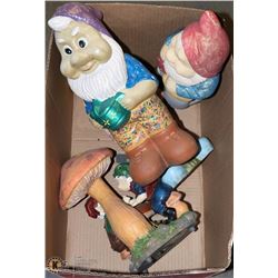 A SET OF 4 LARGE CERAMIC  GNOMES