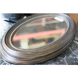 PAIR OF FRAMED OVAL MIRRORS