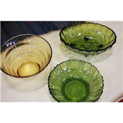 TWO GREEN GLASS BOWLS AND YELLOW GLASS BOWL