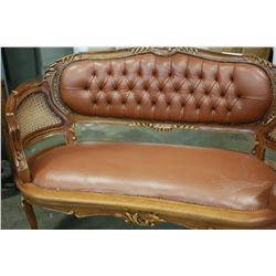 HIGHLY CARVED BROWN LEATHER BUTTON BACK SETTEE AND TWO ARMCHAIRS WITH BERGERE SIDES