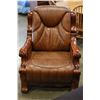 Image 1 : BROWN LEATHER ARMCHAIR WITH WOOD TRIM