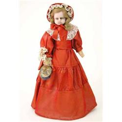 A Victorian poured wax doll, probably Pierotti, with fixed paperweight eyes, brown hair, wax arms...