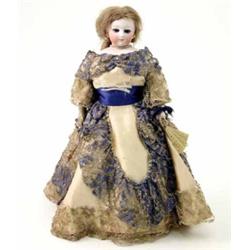A rare French fashion doll by Simone, bisque head with fixed paperweight eyes, closed mouth, brow...