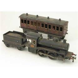 A Bing gauge 1 spirit-fired live steam Locomotive and Tender, No. 1902, O-4-O locomotive hand-pai...