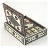 Image 1 : A Syrian ivory trinket box, with geometric inlay, the lid enclosing an interior of nine compartme...