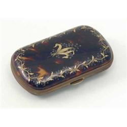 A tortoiseshell pique case, inlaid with silver and gold foliate motifs and gilt metal hinge clasp...