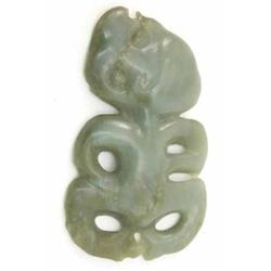A carved green hardstone Maori Tiki, 3.5 ins...