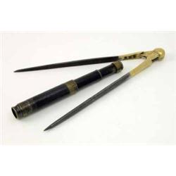 A small 19th century lacquered brass telescope, three drawer with leather grip and cover, the eye...