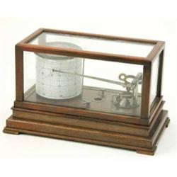 An American barograph by Taylor Instrument Companies, with chrome drum and fittings in glazed mah...