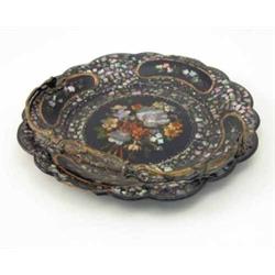 A mid Victorian papier mache dish, painted and inset with mother of pearl floral motifs, with cas...