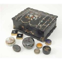 A mid Victorian papier mache box, inset with mother of pearl, lid detached, together with an asso...