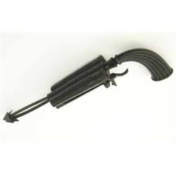 A Reuthes patent percussion animal trap pistol, cast iron construction with two pronged arrows co...
