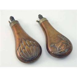 Two Dixson & Sons copper shot flasks, the first embossed with a Pointer and foliage, the other wi...
