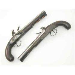 A pair of flintlock holster pistols by Edgson, with shaped barrels struck and stamped ‘Stamford’,...