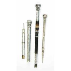 A silver and agate dip pen, with jewel end, together with two Edwardian silver propelling pencils...