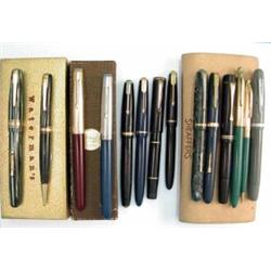A collection of pens, comprising a cased Watermans pen set, a Parker 51 in case, two Parker Duo f...