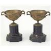 Image 1 : A pair of gilt brass twin handled urns, cast with laurel leaves and fruiting vines on reeded slat...