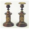Image 1 : A pair of bronzed metal candlesticks, with gilt metal sconces above a knopped stem and supported...