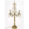Image 1 : An ormolu standard lamp and four wall lights, lamp cast with a dolphin supporting two scroll scon...