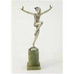An Art Deco bronze figure of a dancer by Josef Lorenzl, the naked girl standing on one leg, the o...