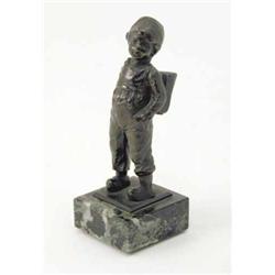 An early 20th century bronze figure of a Dutch boy, modelled wearing a satchel with hands in his...