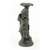 Image 1 : A cast bronze figure of a putto, the draped putto with tambourine leaning against a hollow palm t...