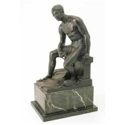 A bronze figure of a classical man signed H. Keck, modelled seated on a plinth with measuring dev...