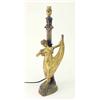 Image 1 : A bronze statuette table lamp, cast as a dancing female figure set against a column lamp base cas...