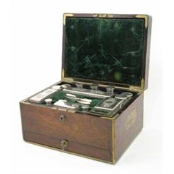 A Regency brass bound rosewood toilet box, with silver plated mounted glass fittings by J. Richar...