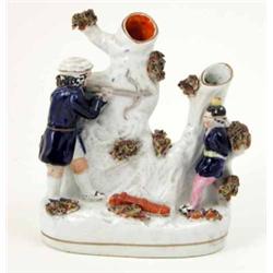 A Victorian Staffordshire pottery William Tell group, characters standing beside spill vase tree...