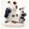 Image 1 : A Victorian Staffordshire pottery William Tell group, characters standing beside spill vase tree...