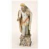 Image 1 : A late 18th century Staffordshire figure of St. Philip, bearded character in long robe, standing...