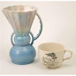 A Beswick blue-glazed jug moulded in Art Deco style (10in.) and an Adams cup printed in black mon...