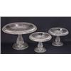 Image 1 : A Victorian clear glass tazza, cut with diamonds and with turnover rim (10in.) and a pair of smal...