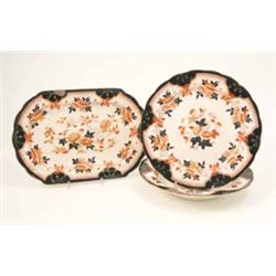 An eleven-piece Staffordshire pottery part dinner service, comprising seven soup plates, three di...