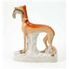 Image 1 : A Victorian Staffordshire pottery greyhound, painted in rust enamel, holding dead rabbit in jaw,...