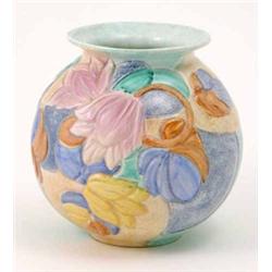 A Beswick globular vase, ‘carved’ with foliage and painted in pastel shades, 7.25in....