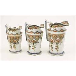 A set of three Victorian graduated ironstone jugs, octagonal tapering form printed and enamelled...