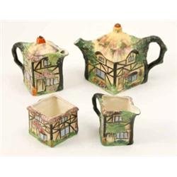 A Grimwade’s “Rubian Art” cottage tea set, consisting of teapot, hot water jug, both with covers,...