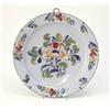 Image 1 : An 18th century delftware charger, probably Dutch, primitively painted with flowers in blue, gree...