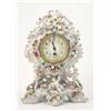 Image 1 : A late 19th century Dresden porcelain mantel timepiece, encrusted with flowers and putti, 15ins...