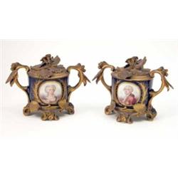 A pair of 19th century Sevres-style and ormolu-mounted pots, ceramic bodies painted with portrait...