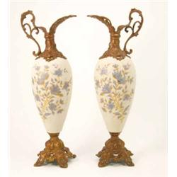 A pair of Victorian glass and spelter-mounted vases, ovoid satin-finished bodies enamelled with f...