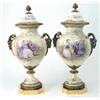 Image 1 : A pair of 20th century Sevres porcelain vases and covers, with ormolu horned-mask handles, mounts...